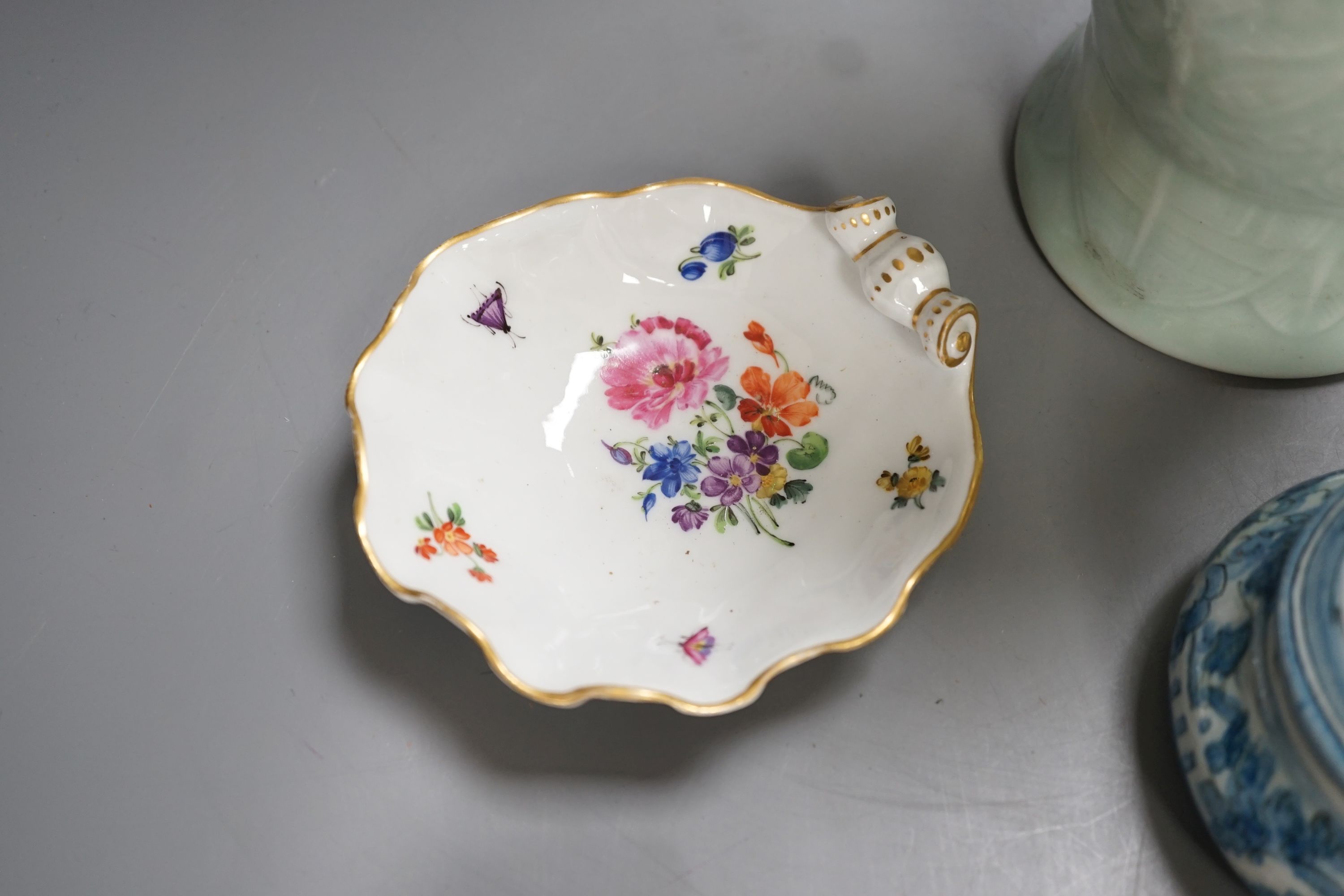 A Royal Copenhagen group of polar bears, a Meissen floral painted ‘shell’ dish, a Japanese celadon ground vase, Italian pottery box and cover etc.